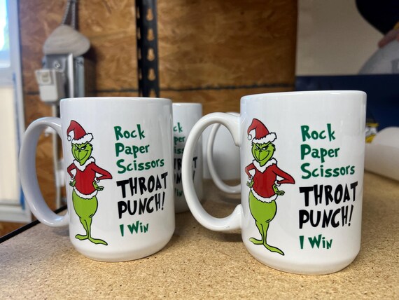 A clipart image of the Grinch wearing a Santa hat. #5773154