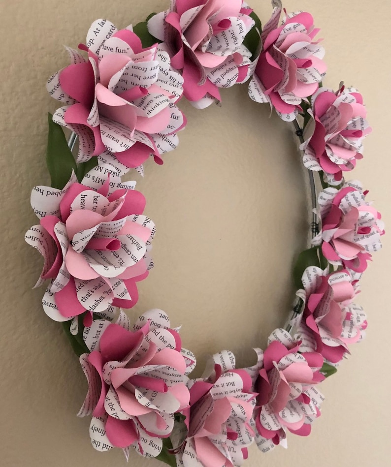 Book flower wreath done in two tone pink flowers with greenery accents Breast Cancer Awareness