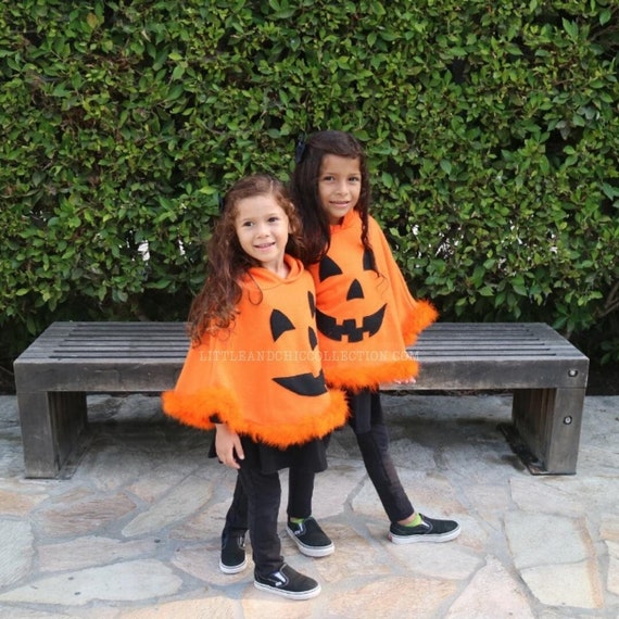 Pumpkin Poncho Adult Black with Orange Face Pumpkin Poncho Adult Black with Orange Face
