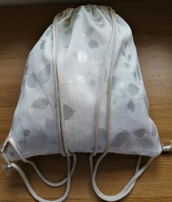 Pull string purse sale