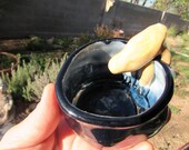 Funky Little Yellow Creature in a Cup