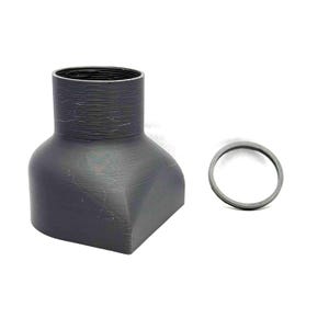 May include: A dark gray, 3D-printed object with a flared base and a cylindrical top. A separate, circular ring is positioned to the right. The object appears to be a component or part of a larger assembly.