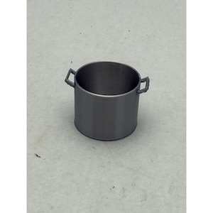 May include: A cylindrical, gray container with two rectangular handles. The container has a smooth, matte finish and appears to be made of metal or a similar material. The design is simple and functional, suitable for various storage purposes.