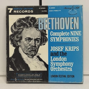 May include: A vintage vinyl record album cover featuring a portrait of Beethoven. The album is titled "Complete Nine Symphonies" by Josef Krips and the London Symphony Orchestra. The cover has a blue and white color scheme with the text "Murray Hill Records".
