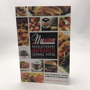 May include: A cookbook titled "The Nuwave Oven Complete Cookbook" with the text "Revolutionary Infrared Cooking System." The cover features a collage of cooked food items, including pizza, shrimp, and burgers.