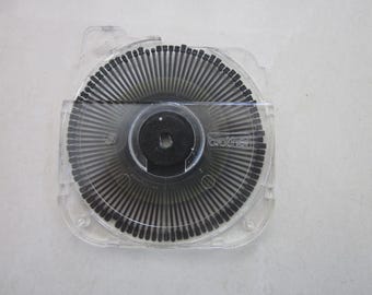 Máquina de escribir eléctrica Brother Brougham 10 en inglés, con rueda de impresión tipo margarita.