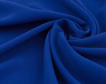 Vestido de noche tejido crepe liso azul ligeramente elástico; Tela de vestir italiana; Tejido de poliéster; Tela fluida para vestidos y pantalones