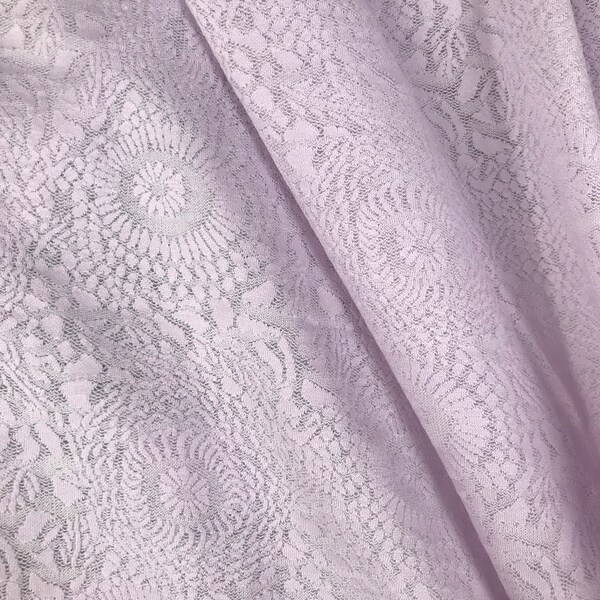 Light cotton jersey in a delicate shade of lilac. Ribbed jersey fabric and lace style jersey sold by the metre.