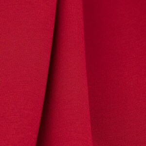 Cherry red ponte knit jersey fabric with soft drape, perfect for structured T-shirts, loungewear and skirts