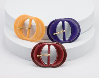 70ies Belt Buckles with Marbled Finish in Red, Violett and Yellow - Oval Shaped