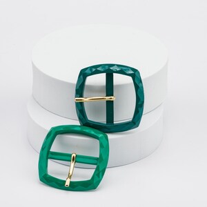 green vintage belt buckles