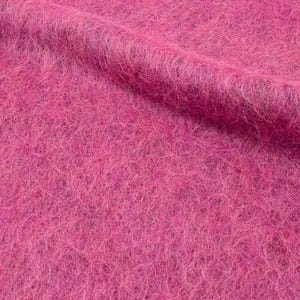Lightweight pink fabric from Italy, fluffy and voluminous, ideal for fashion pieces.