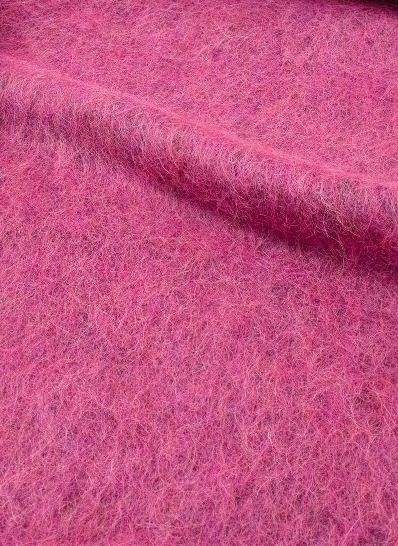Lightweight pink fabric from Italy, fluffy and voluminous, ideal for fashion pieces.