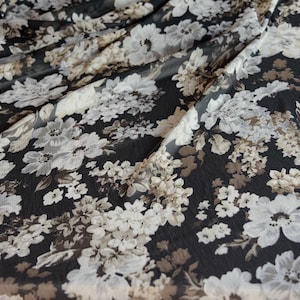 Floral chiffon fabric in black and brown hues - sheer crinkle material for dresses, blouses and room decor