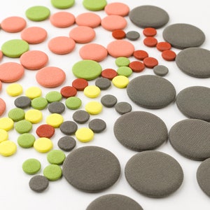 Old, flat, fabric-covered two-hole buttons for jackets and dresses in olive green, apple green, peach pink, yellow & burned red 60&#39;s buttons