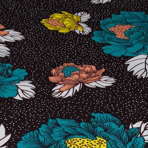May include: Black fabric with a repeating pattern of teal, yellow, and peach flowers. The flowers have a stylized design and are surrounded by white leaves.
