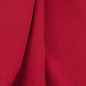 Italian ponte roma fabric in cherry red, smooth viscose jersey with elastane for trousers and jackets