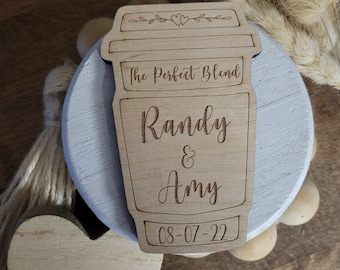 May include: Wooden cutout of a coffee cup with the text "The Perfect Blend" and the names "Randy & Amy" and the date "08-07-22".