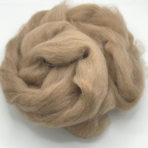 Combed qiviut top