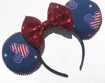 Orejas patrióticas de Mickey Mouse: lazo de lentejuelas y bandera estadounidense