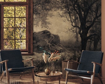 May include: Two dark blue chairs with wooden frames sit in front of a wall mural depicting a forest scene with a large tree and a rock formation. The chairs are facing each other and a small table with a vase of flowers sits between them.