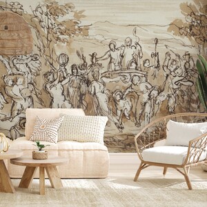 Puede incluir: Un interior de sala de estar con un sofá beige y una silla de mimbre. La pared está decorada con un dibujo en tinta negra y blanca de un grupo de personas en un paisaje.