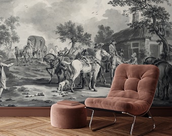 May include: A black and white vintage illustration of a group of people on horseback, with a carriage in the background. The illustration is printed on a wall behind a brown armchair with a tufted back.