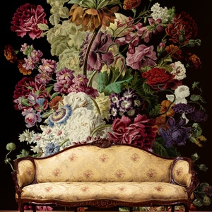 May include: A vintage-style floral wallpaper featuring a large bouquet of colorful flowers, including roses, lilies, and carnations, arranged in a vase. A beige fabric sofa with ornate wooden legs sits in front of the wallpaper.