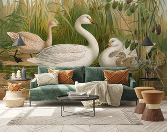 May include: A living room scene featuring a teal sofa with decorative pillows and a patterned rug. The focal point is a large mural depicting swans in a marsh setting. Side tables, a coffee table, and stools complete the room's decor, creating a nature-inspired ambiance.