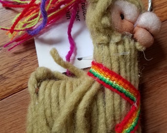 Llavero de hilo de llama o amuleto de bolso
