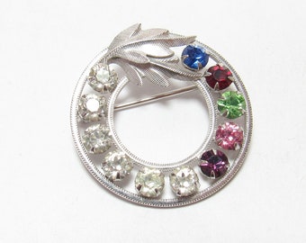 DCE OF CURTIS Sterling Silver Synthetic Multi Color Rhinestone Circle Brooch 5.00 Cts 1950's Vintage