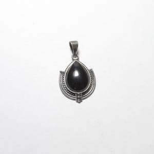 May include: A silver pendant with a teardrop-shaped black stone. The stone is set in a decorative silver frame with a loop at the top for a chain. The pendant has a simple, elegant design.