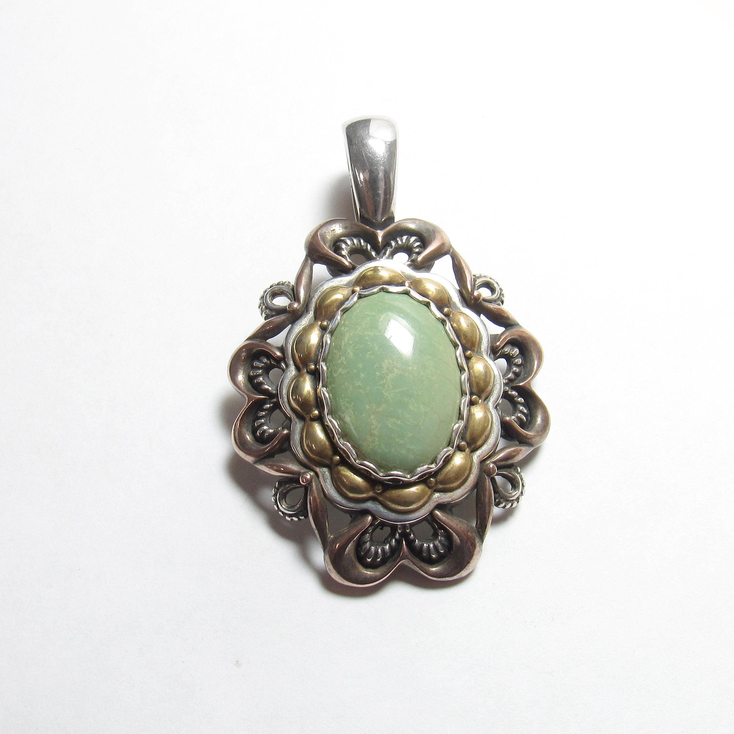 ヴィンテージズニ族マルチジェムストーンキャロリンポラックペンダント