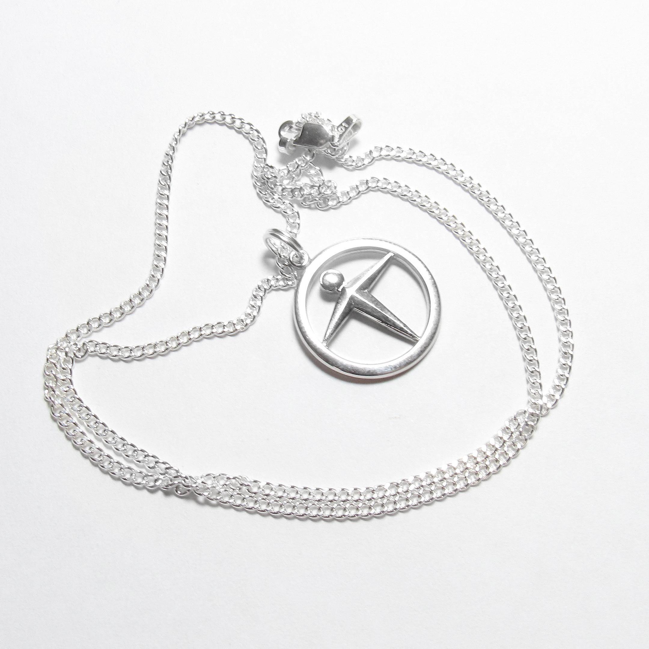 TIFFANY & CO Sterling Silver Manpower Unity Symbol Pendant With 