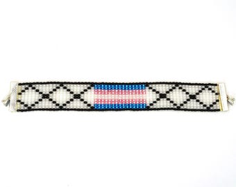 Trans: a transgender pride flag loom beaded bracelet