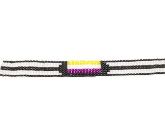 Enby: a non-binary pride flag loom beaded bracelet