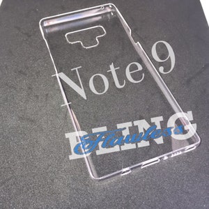 May include: A clear plastic phone case for a Samsung Galaxy Note 9. The case is designed to protect the phone from scratches and bumps. The case has the words "Note 9" and "Flawless Bling" printed on it.