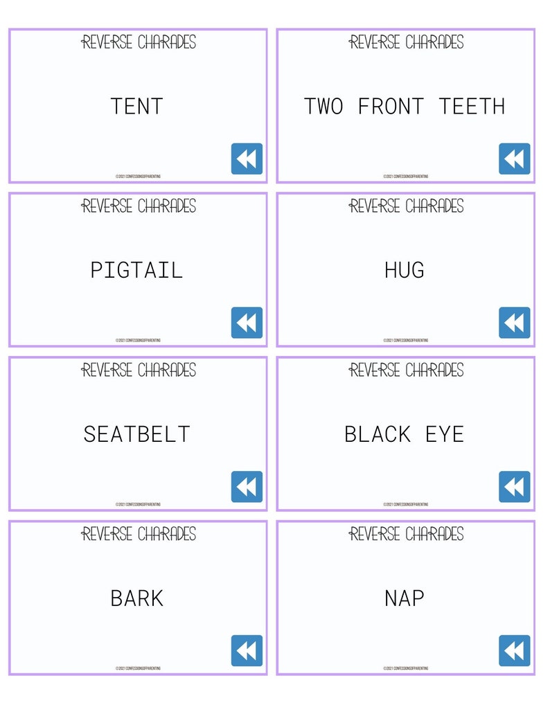 Peut inclure: Huit cartes violettes avec le texte "Reverse Charades" en haut de chaque carte. Chaque carte a un mot ou une phrase diff&eacute;rent &eacute;crit en texte noir : "Tent", "Two Front Teeth", "Pigtail", "Hug", "Seatbelt", "Black Eye", "Bark", et "Nap".