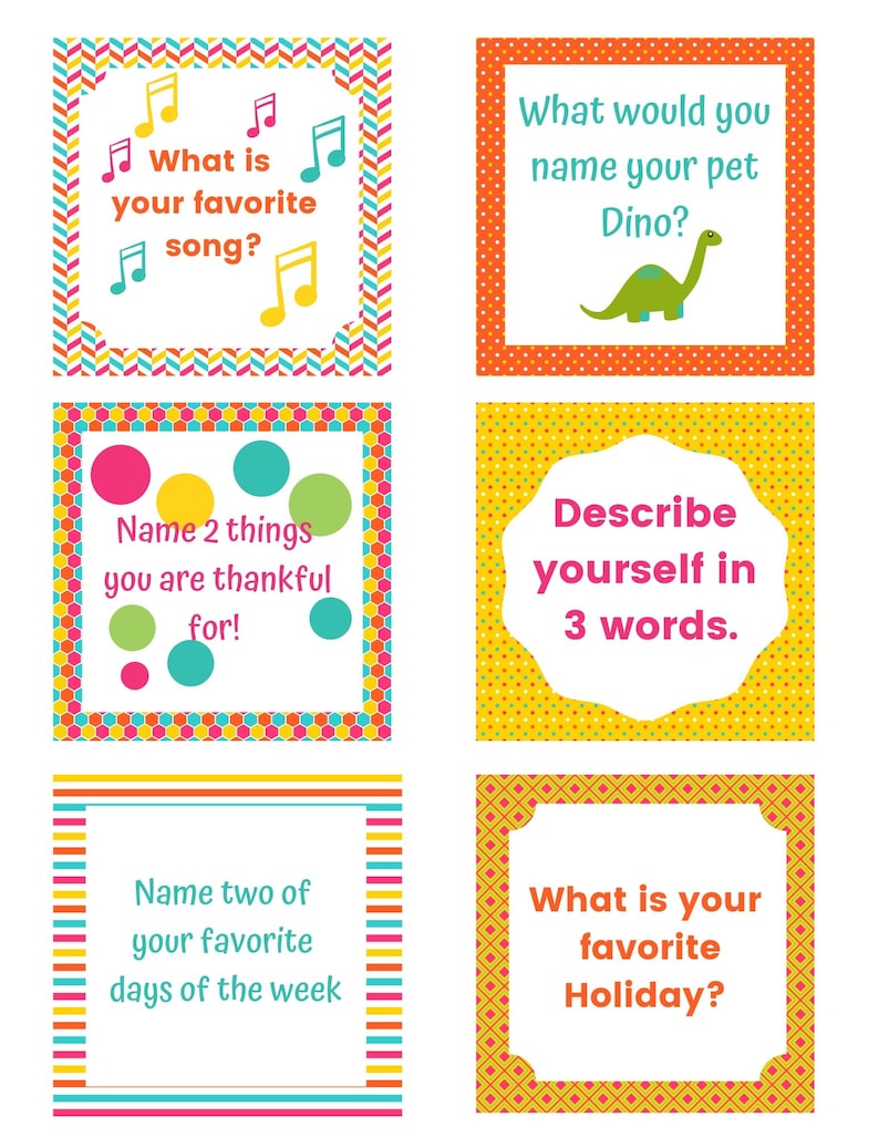 May include: A set of colorful cards with prompts for a game. The cards have different colored borders and patterns. The prompts include questions like "What is your favorite song?" and "What would you name your pet Dino?"