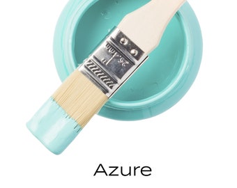 May include: A small jar of turquoise blue Fusion Mineral Paint with a paintbrush dipped in the paint. The jar is labeled "Fusion Mineral Paint" and the color is "Azure".