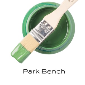 May include: A small jar of green paint with a paintbrush on top. The paint is labeled "Fusion Mineral Paint" and the color is "Park Bench".