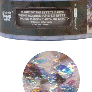 May include: A jar of iridescent glitter paste labelled "Magic Potion Effect Paste." The jar has a black lid and a label with text in English, French, and Spanish. A close-up shows the glitter's shimmering, multi-coloured effect. The jar contains 100 ml.