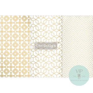 May include: Three gold geometric patterned paper sheets with the text "re-design with prima" and "DIY simplified" on the middle sheet. The right sheet has the text "VIP Top Tier Redesign Retailer".