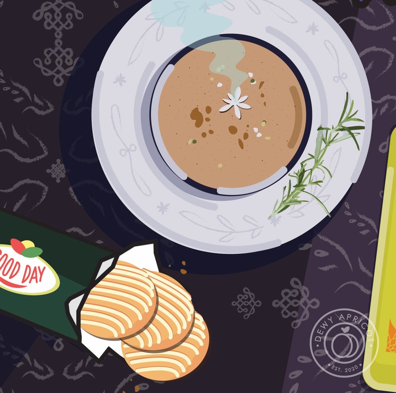 May include: A white plate with a bowl of brown soup topped with a white flower and a sprig of rosemary. The plate is on a dark purple background with a green and white package that says "Good Day" and a stack of three yellow cookies.
