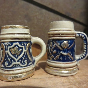 set of two 1&quot; vintage miniature blue/cream German steins