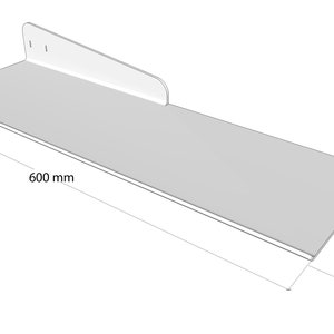 May include: A white, wall-mounted shelf with a minimalist design. The shelf is 23.6 inches long and 8.9 inches wide. It features a raised back and a slightly curved front edge. The design includes three pre-drilled holes for mounting.
