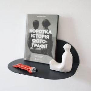 Small matte black metal shelf, Modern floating bookshelf, Minimalistic rounded bedside shelf, Handmade textured wall mounted shelf