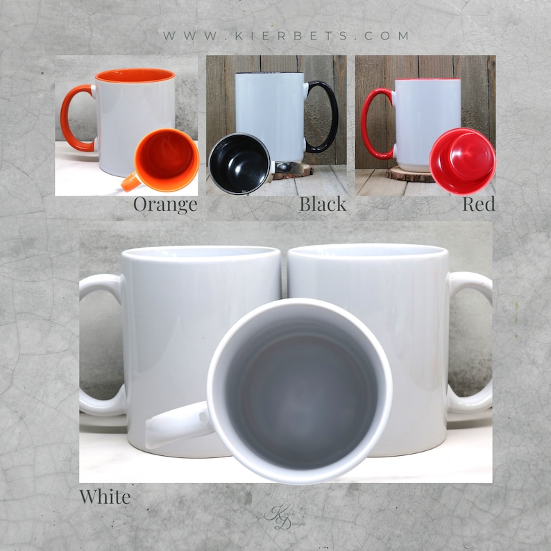 May include: Four ceramic mugs with different colored rims. The mugs are white with a black rim, orange rim, red rim, and a white rim. The mugs are all the same size and shape.