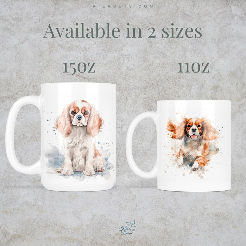 May include: Two white ceramic mugs with watercolor illustrations of a Cavalier King Charles Spaniel dog. The mug on the left shows the dog sitting and the mug on the right shows the dog running. The text "Available in 2 sizes" is at the top of the image. The text "15oz" is below the left mug and the text "11oz" is below the right mug.