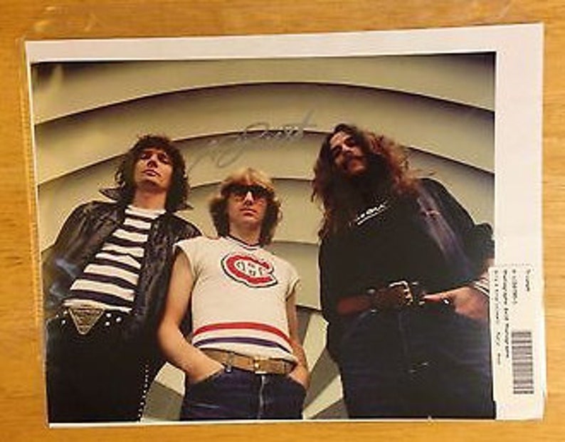 Signed Rik Emmett 8 x 10 photograph of TRIUMPH UACC Canada